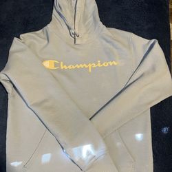Sky blue Champion hoodie with yellow text