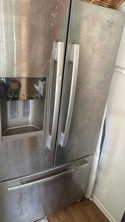 Whirlpool French style refrigerator MOVING SALE MUST GO ASAP.