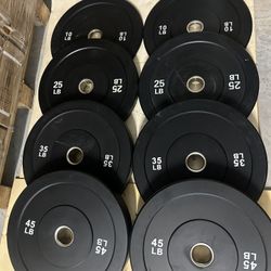 New complete set of 10,25,35, and 45lb rubber olympic plates $230