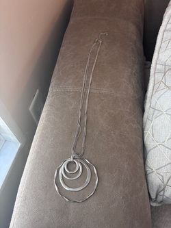 Long Silver Multi-Ring Pendant Necklace