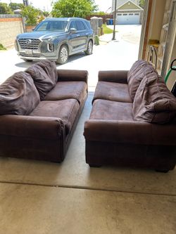 Brown leather couches