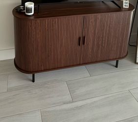 Dresser w storage and sliding doors must go