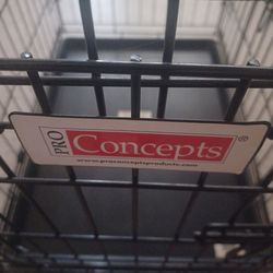 PRO CONCEPTS DOUBLE DOOR CAGE, USE BUT STILL GOOD ,2 FEET LONG, 1-1/2 WIDE, ONLY PICK UP