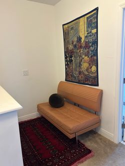 Tan Leather Armless Bench Sofa with Chrome Legs