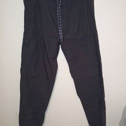 Men's size medium DKNY black pants used good condition $5 pick up in Edinburg no holds
