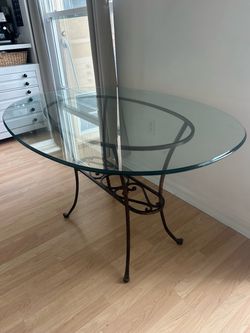 Glass top dining table