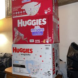 3 Boxes Of Huggies Diapers
