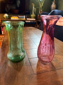 Tinted glass vases, pink and green, $5 each