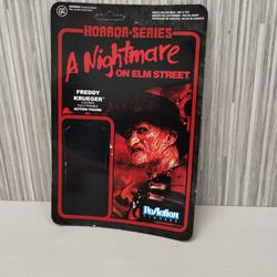 Reaction Freddy Krueger action figure 2014

Nightmare on elm street. Cardboard packaging ONLY.