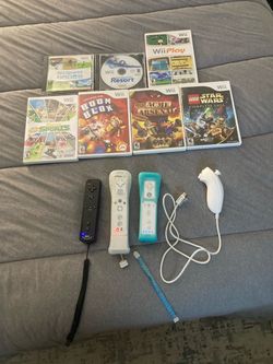 Wii Console Set W/ 3 Controllers (2 Motion Plus) + 1 Nunchuck + 7 Games