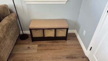 Bench with slide out storage