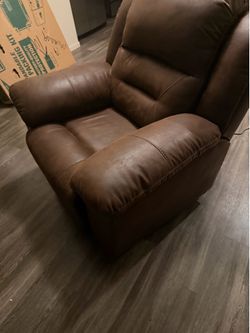 Rocking leather recliner