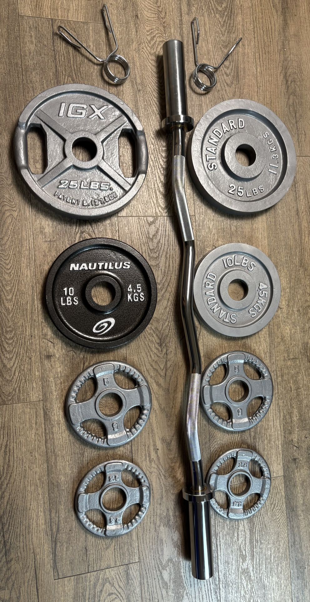 NEW Olympic Curl Bar With Pairs From 5s To 25s [total: 105 lbs)