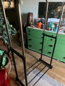 Brand new rolling laundry clothes rack