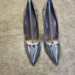 Size 35 Silver Pointed Toe Shoes With Red Bottom