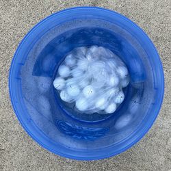 32 Used Golf Balls + 12 Titleist Practice