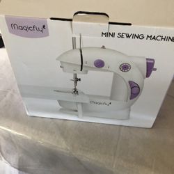 Brand New Mini Magic Sewing Machine Tested Works Perfectly when you come ill fully test it for you 