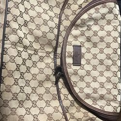 Gucci messenger bag and a black gucci tote bag 