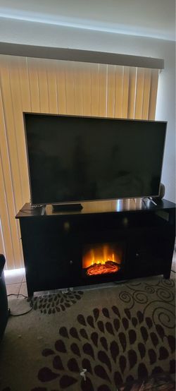 Black TV stand w/ Built in Electric Fireplace