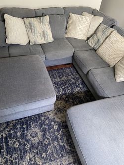 5- Piece Performance Fabric Sectional With Chase And Oversized Ottoman