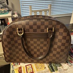 Louis Vuitton Nolita 