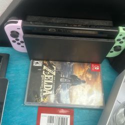 Nintendo Switch And A Couple Games 