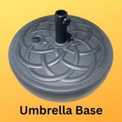 New, 22 Inch round umbrella stand that can be filled with sand or water, weighing 64 lbs.