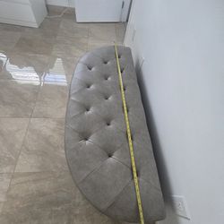 Half moon storage ottoman