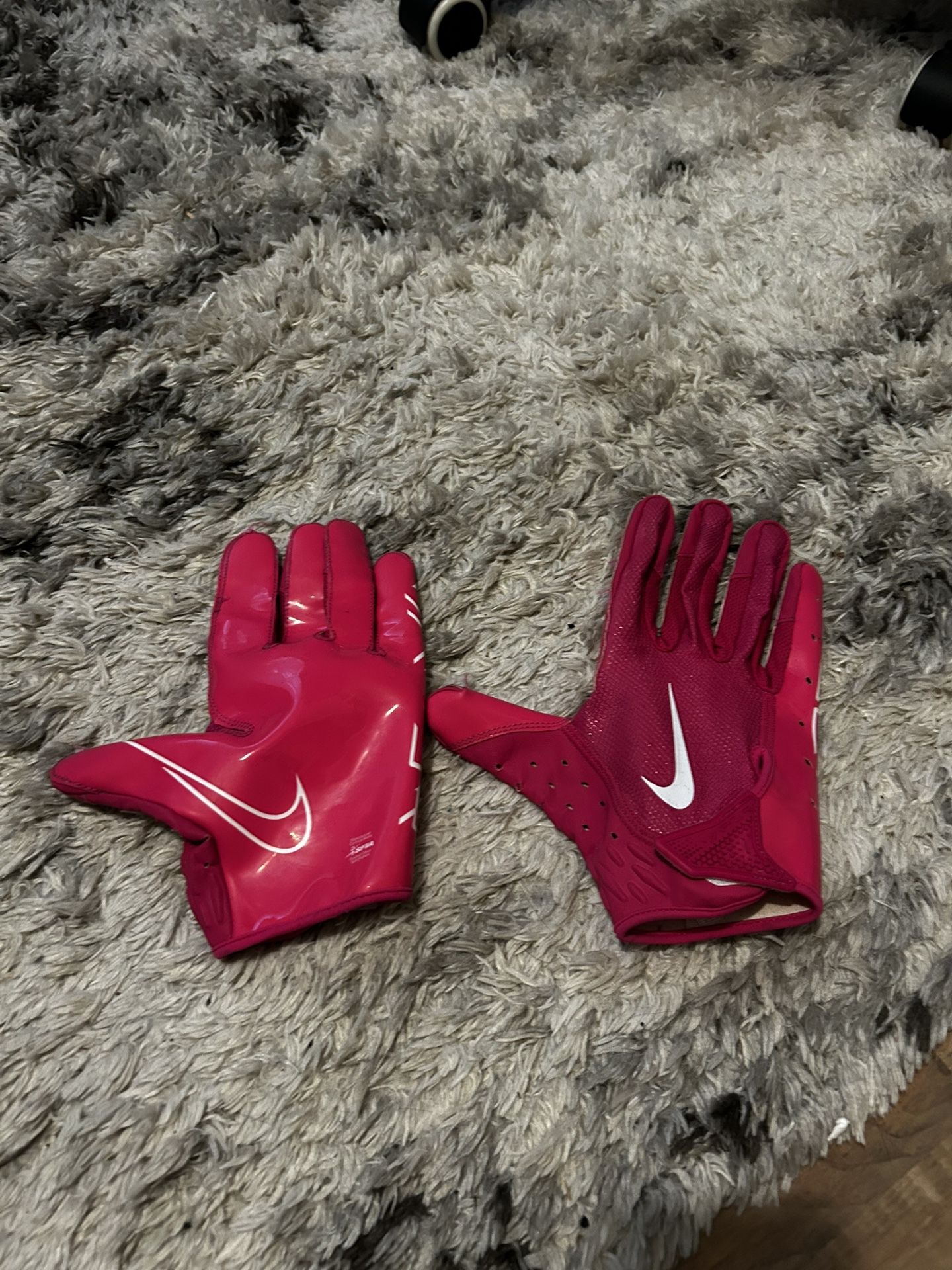 Pink Nike football gloves