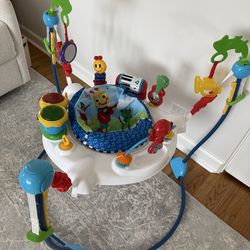 Baby Einstein Neighborhood Symphony Activity Baby Jumper Activity Center, Infant Entertainer with Lights and Melodies, Age 6 Months +, Max Weight 25 l