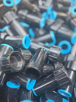 Genuine Raindrip 305G00 0.710" Compression End Cap with Blue Compression Ring. Designed to securely seal the end of 0.710 OD drip irrigation tubing. N