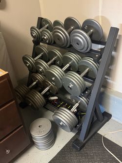 Pro style dumbbells and rack. 790lbs of dumbbells