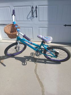 Child's bike with a basket good condition