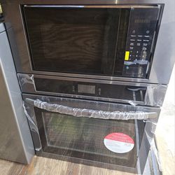DARK STAINLESS STEEL ELECTRIC MICROWAVE - CONVECTION OVEN COMBO....NEW....$ 1,000