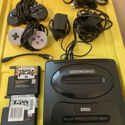 Sega Genesis Slim  w/ Extra’s