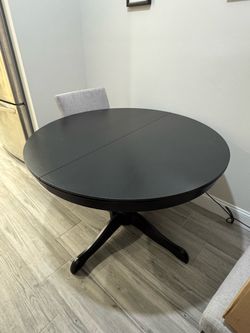 Ikea black table expandable heavy bottom