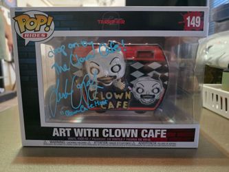 Terrifier 2 clown cafe art the clown funko pop rides signed by Leah voysey