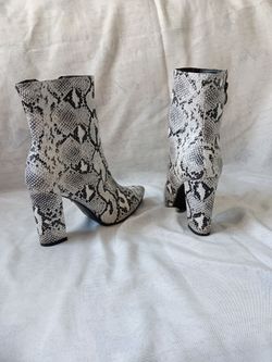 pointed-toe faux snakeskin ankle boots