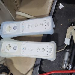 Nintendo Wii Wii u  Controllers With Covers And  Straps
Works for either system
Both working perfectly