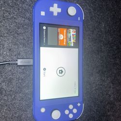 Nintendo Switch Lite HDH-001 Handheld Console - Blue- Like New, Barley Used.