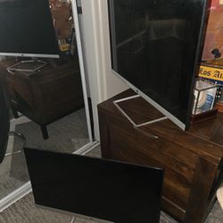 Two Hewlett Packard (HPf 25" Model) Monitors