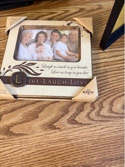 Brand new photo frames in great condition. Each $1