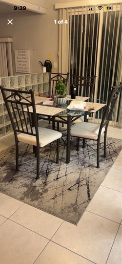 Table and 4 chairs $300 or best offer.