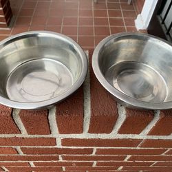 Two 7” stainless steel dogs/cats /utility bowls