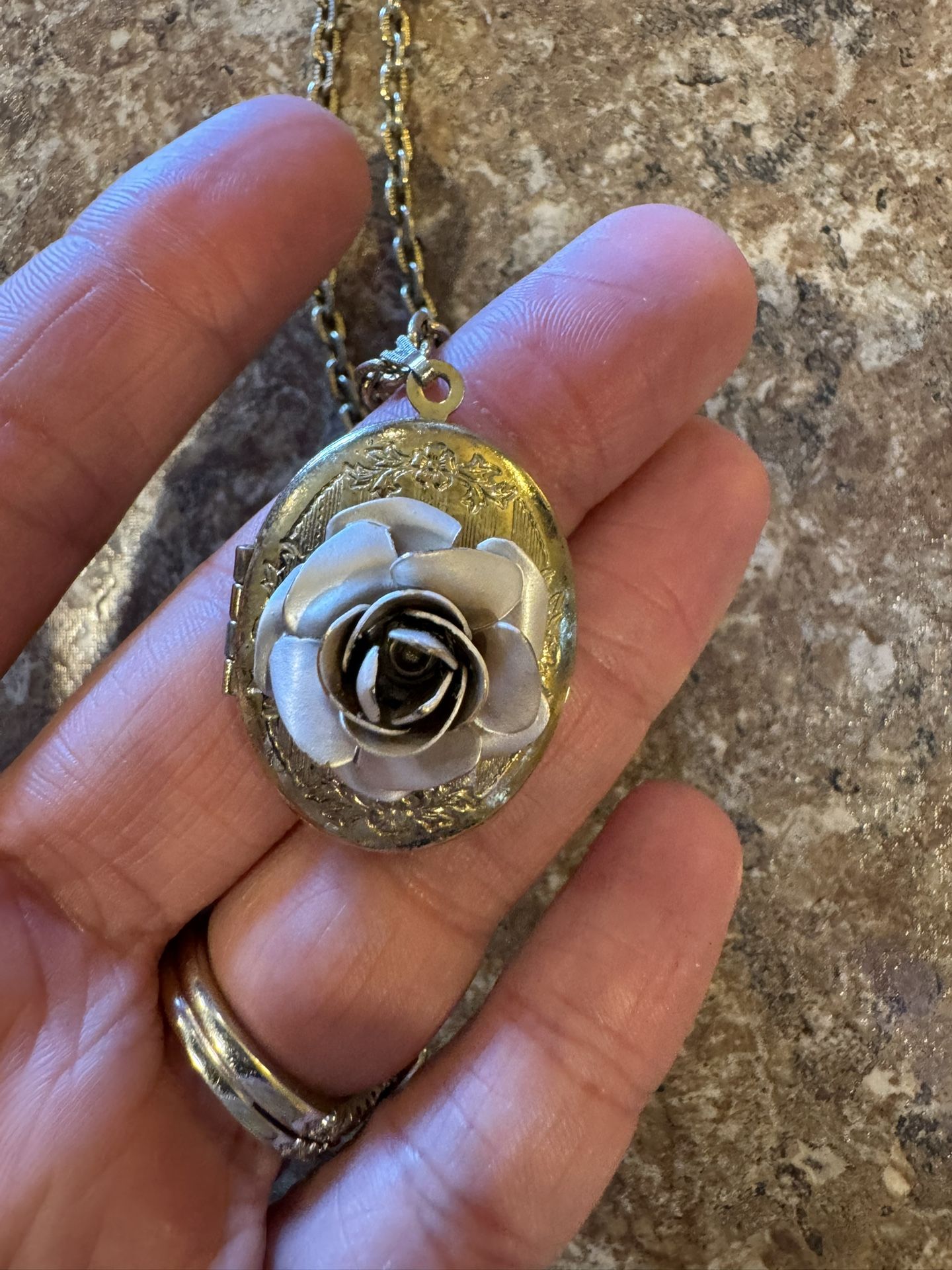 Woman’s vintage locket with a rose on it shipping available