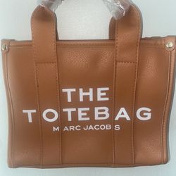The Mini Leather Bag In Brown 