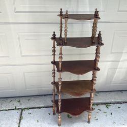 Antique 5 all wood shelves these are made of a era gone bye scrolled carving and craftsmanship base  21long—11.5deep— 49.25 tall 