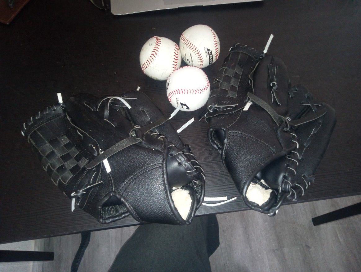 2 Baseball Gloves And 3 Balls