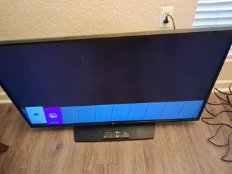 LG Flat Screen TV with Remote