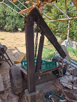Receiver hitch mount cherry picker engine hoist.